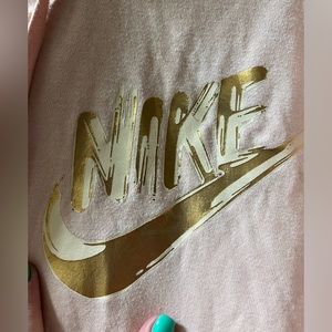 Women’s pink Nike zip up hoodie. Great condition, size Large